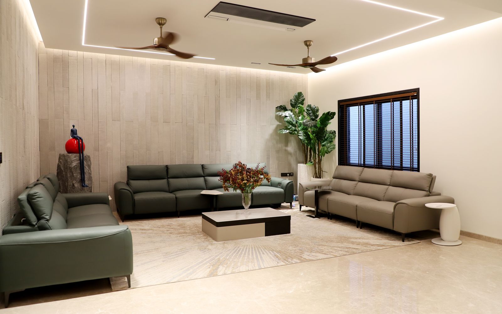 Hotel lobby with a stone reception desk and layered lighting
