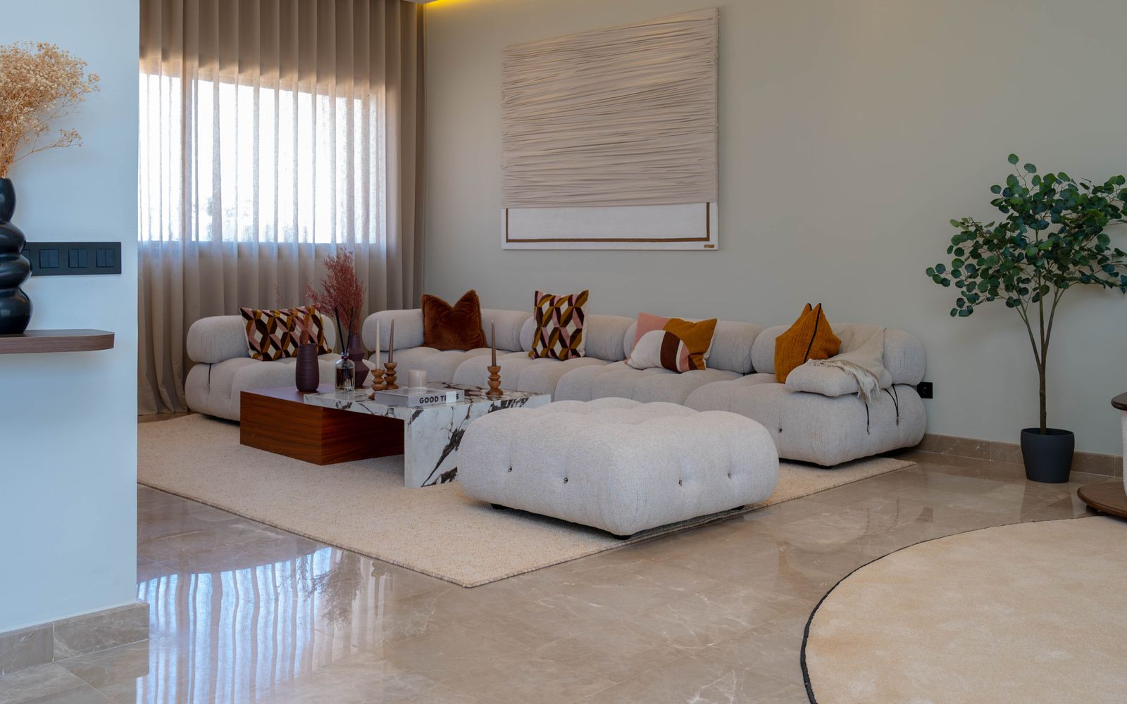 Office lounge with modular seating and a rug